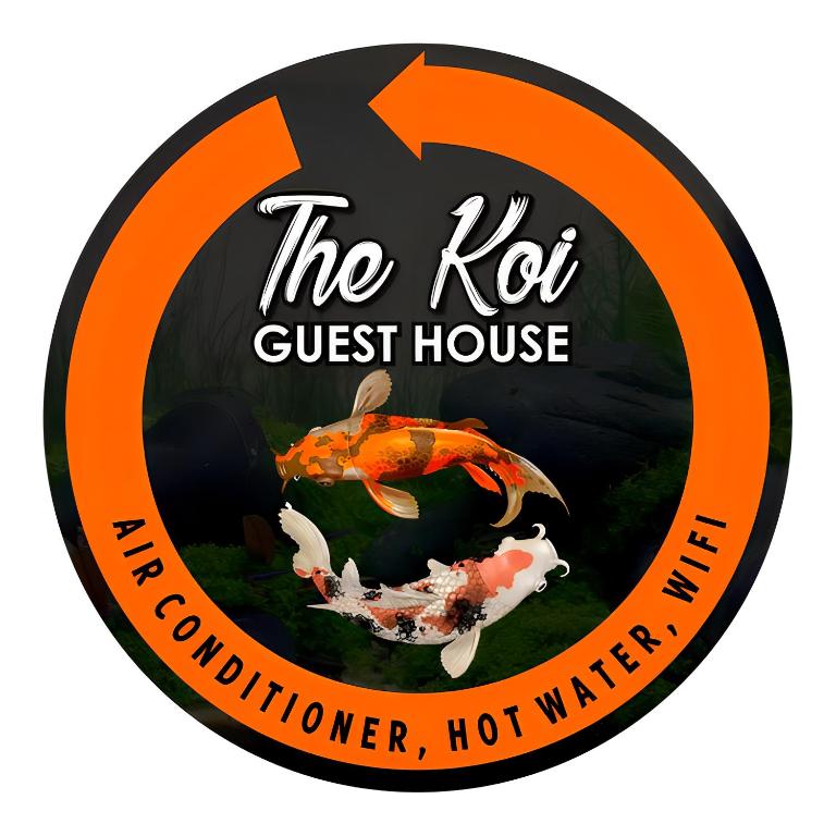 a sign that reads the not guest house with a koi in a pond at The Koi Guest House in Canggu