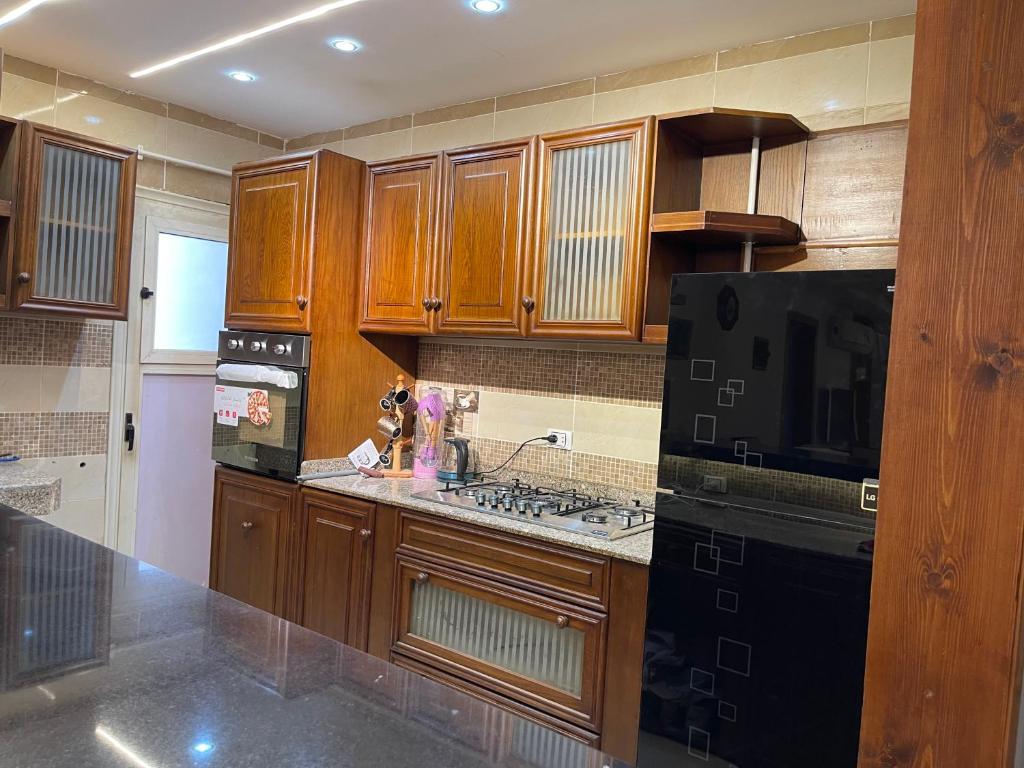 Kuchyň nebo kuchyňský kout v ubytování 3bedroom family apartment