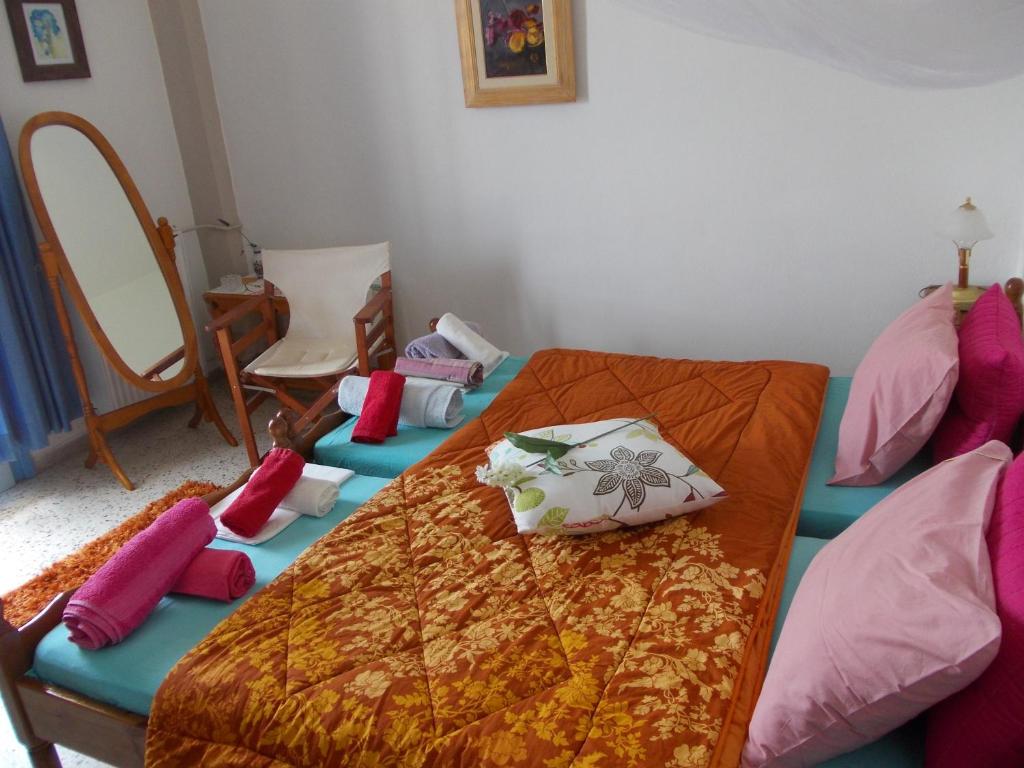 Postel nebo postele na pokoji v ubytování Kassimiotis