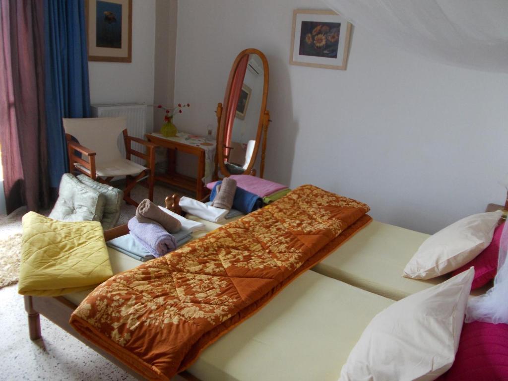 Postel nebo postele na pokoji v ubytování Kassimiotis