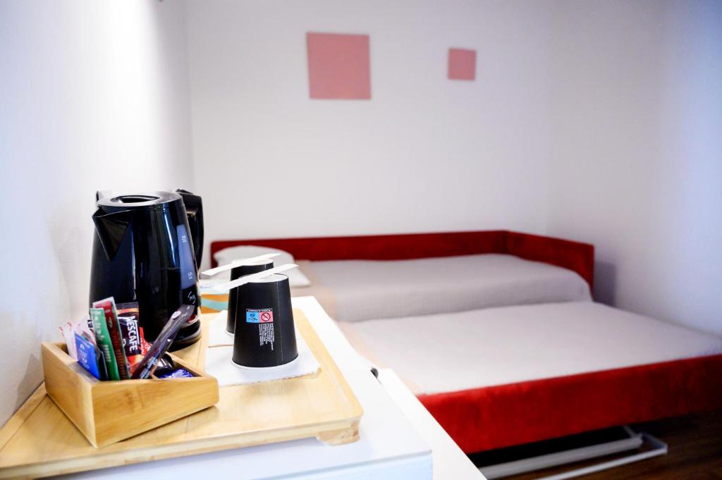 Postel nebo postele na pokoji v ubytování Hotel El Greco