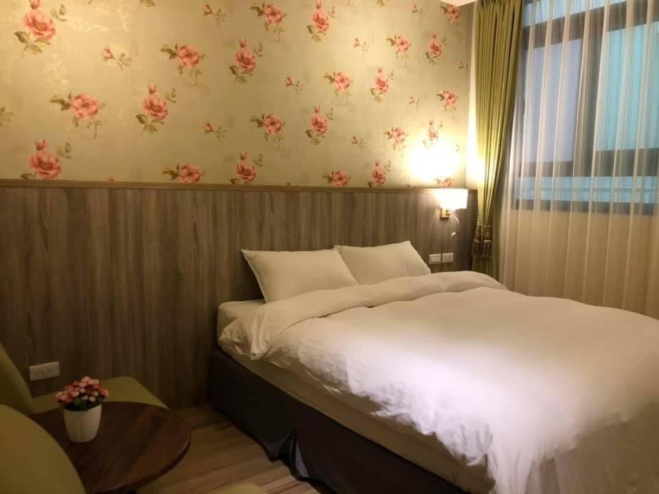 Postel nebo postele na pokoji v ubytování 南庄漫晨旅店Nanzhuang Manchen B&B