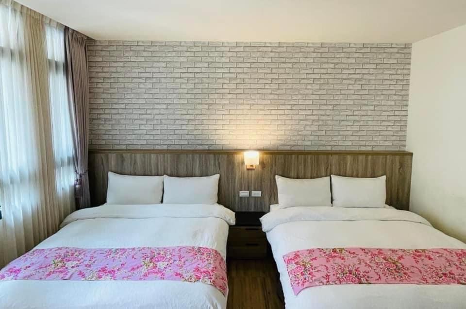 Postel nebo postele na pokoji v ubytování 南庄漫晨旅店Nanzhuang Manchen B&B