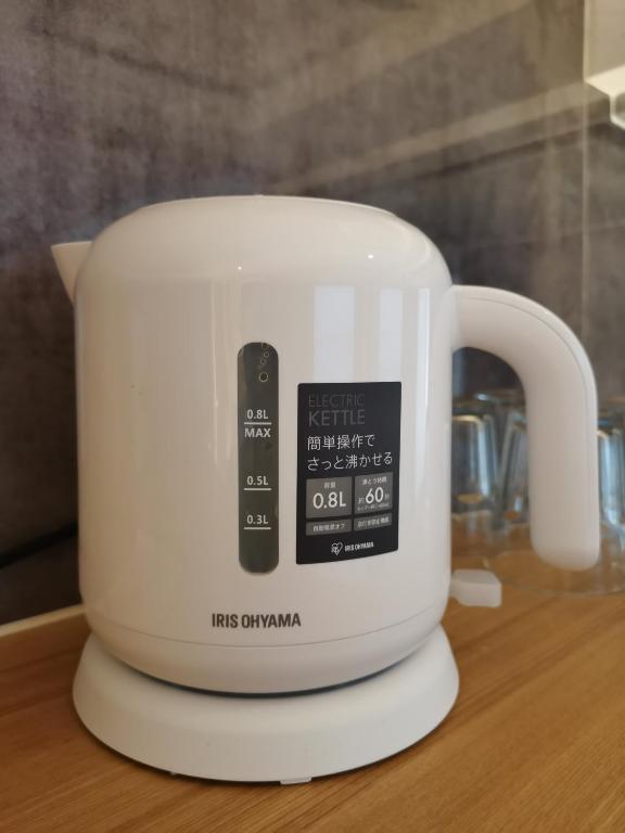 Příslušenství pro přípravu čaje a kávy v ubytování Nplus Tokyo Akihabara Premium