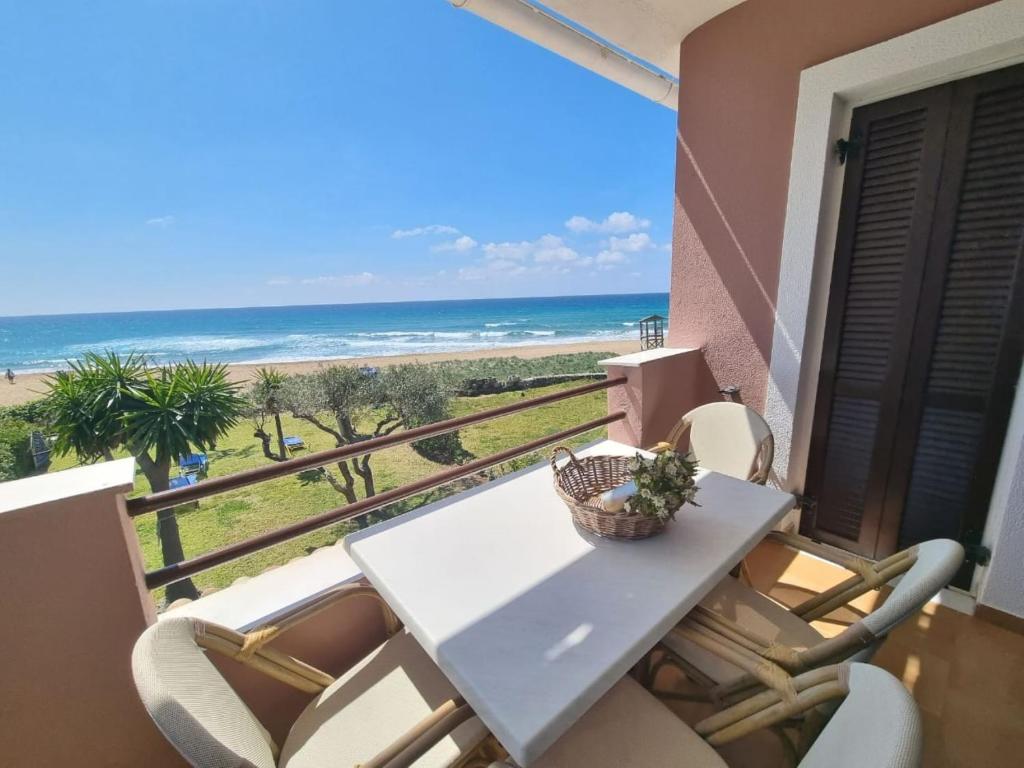 A balcony or terrace at Glyfada Beachfront Apartment A3g 58a