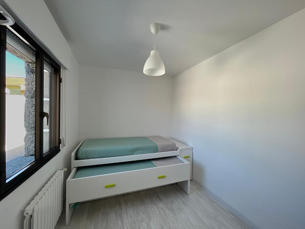 Postel nebo postele na pokoji v ubytování Casa Rosquillas