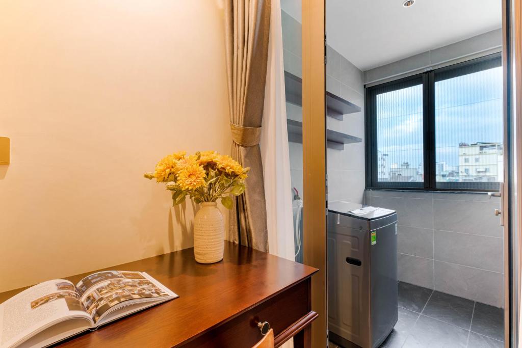Giường trong phòng chung tại MK Riverside Apartment by Haviland