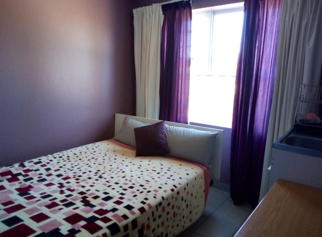 Postel nebo postele na pokoji v ubytování Heart to Heart