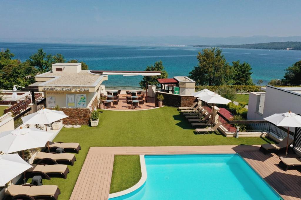 an aerial view of a resort with a swimming pool at Blue Waves Resort in Malinska