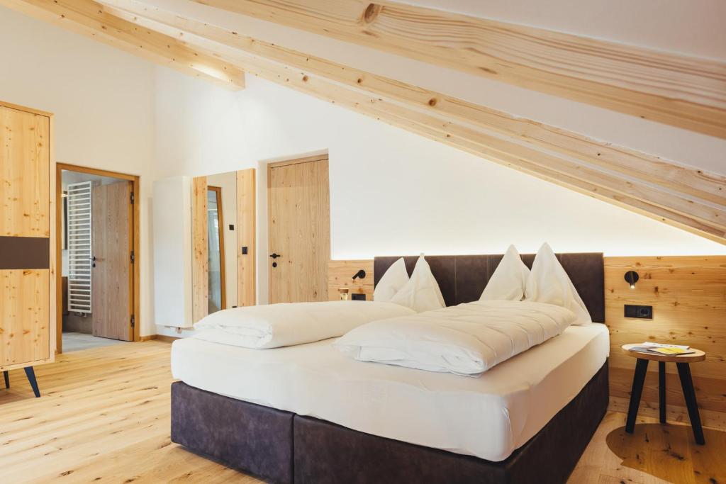 Postel nebo postele na pokoji v ubytování Hotel Schmuckhof