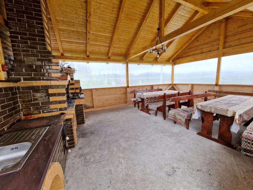 Balkón nebo terasa v ubytování Cabana Poiana Dealul Frumos