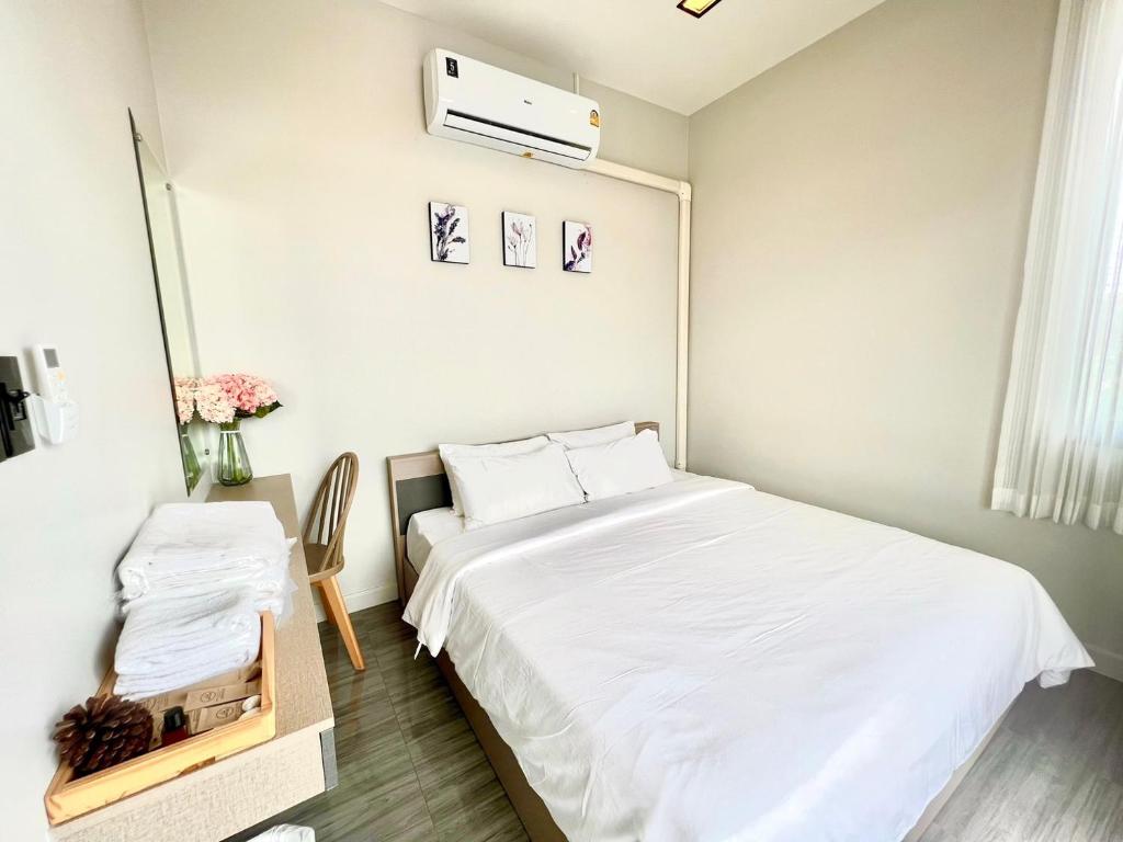 Postel nebo postele na pokoji v ubytování High Life Pool Villa Khao Kho T7