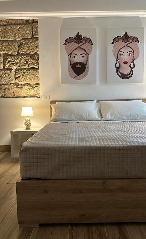 Postel nebo postele na pokoji v ubytování Il Moro