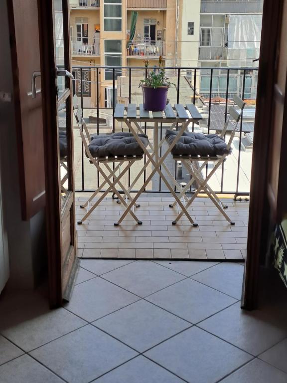 A balcony or terrace at Stanza Privata in Casa Condivisa - Private Room in Shared Home