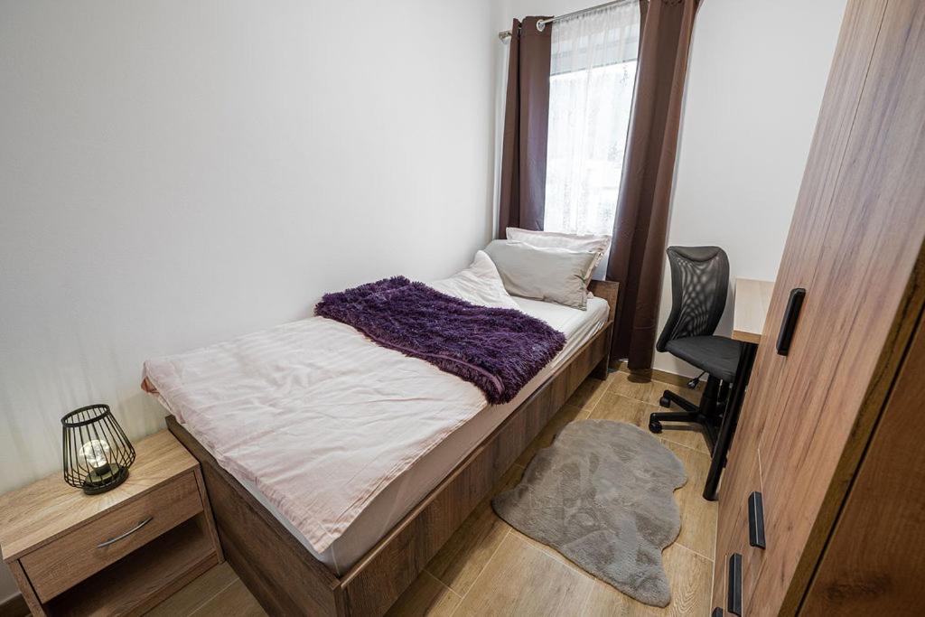 Postel nebo postele na pokoji v ubytování Apartmaji Koza