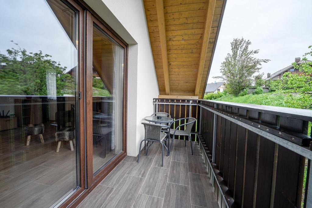 Balkón nebo terasa v ubytování Apartmaji Koza