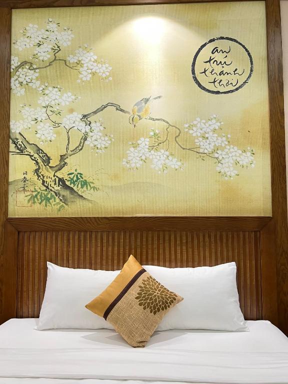 Postel nebo postele na pokoji v ubytování Samatha Hotel Bai Chay, Ha Long
