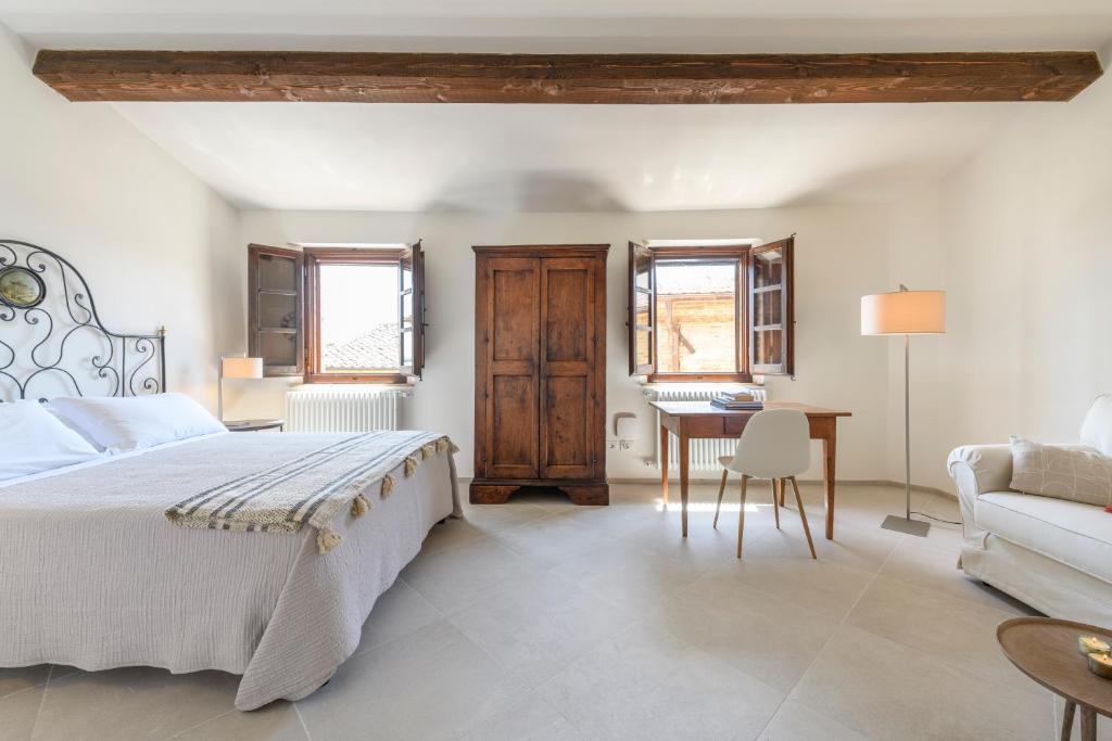 Postel nebo postele na pokoji v ubytování Albergo Diffuso Borgo Santo