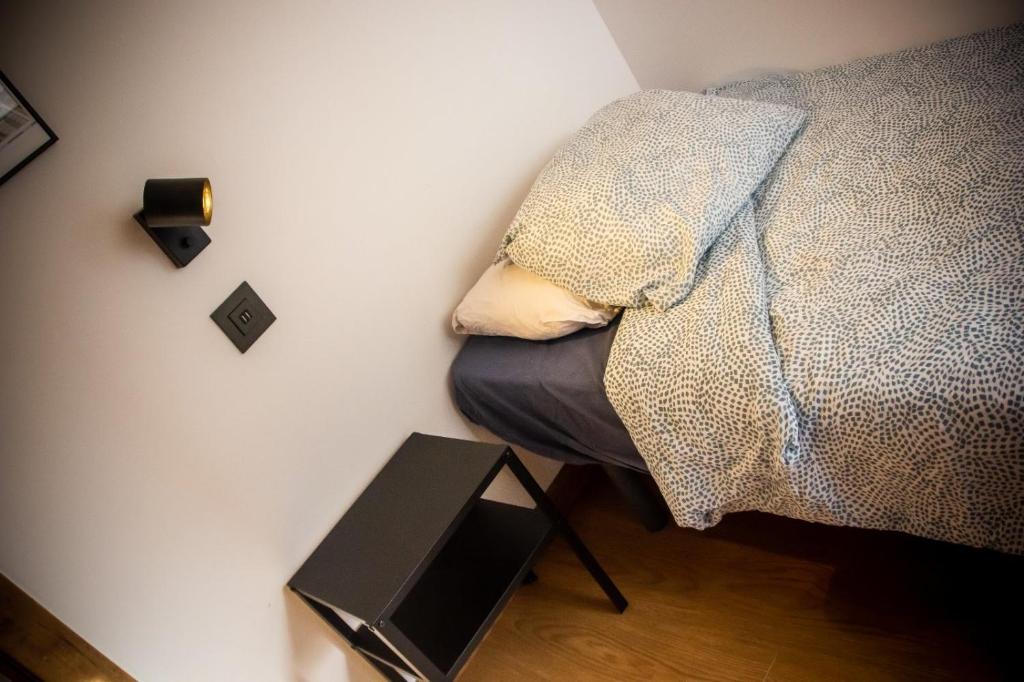 Postel nebo postele na pokoji v ubytování Onefam Sungate