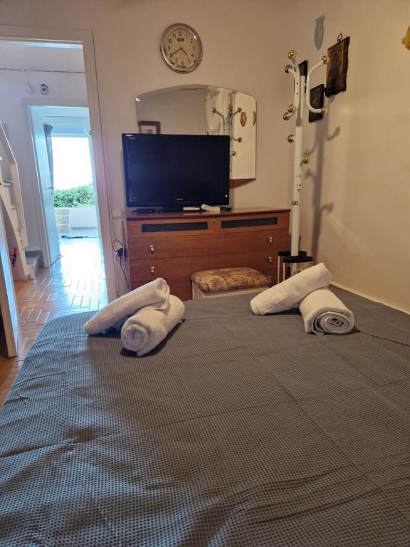 Postel nebo postele na pokoji v ubytování Korinthian sea view