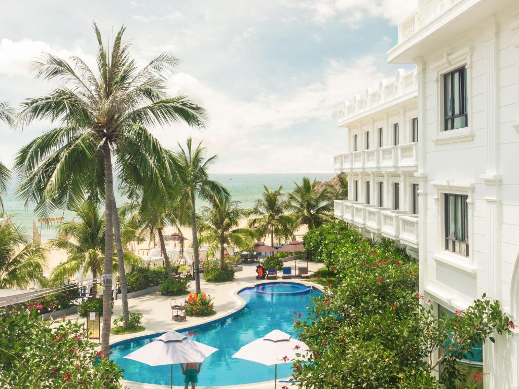 a view of the pool at the resort at Seaside Boutique Resort Quy Nhon in Quy Nhon