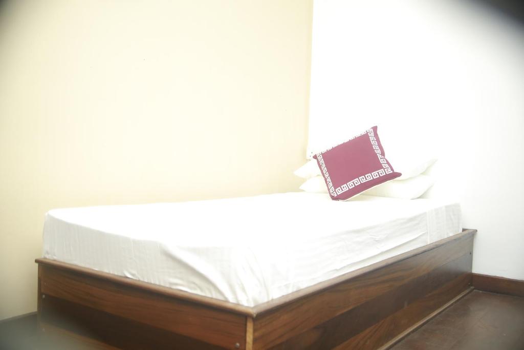 Postel nebo postele na pokoji v ubytování Shanthi Villa Resort