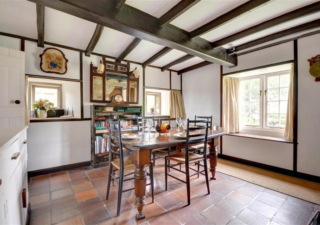 a kitchen with a dining room table and chairs at Rosedale Abbey in Rosedale Abbey