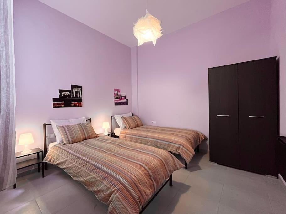 Postel nebo postele na pokoji v ubytování Nafpaktian Port House