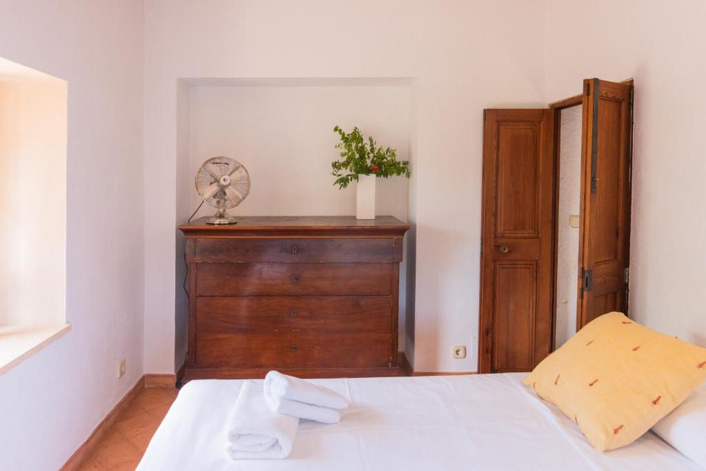 Postel nebo postele na pokoji v ubytování Hortella -Ecofinca-