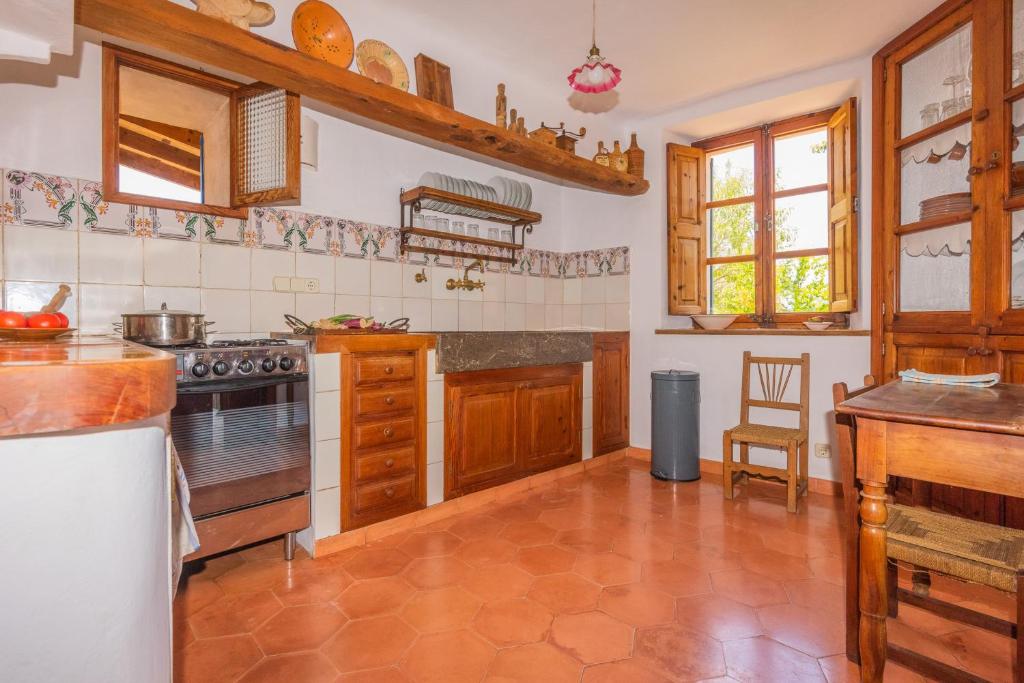 Kuchyň nebo kuchyňský kout v ubytování Hortella -Ecofinca-