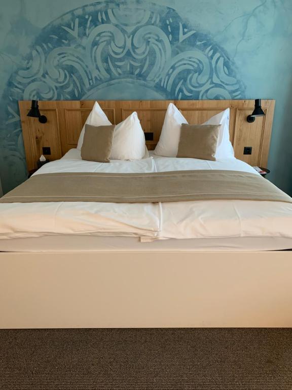 Postel nebo postele na pokoji v ubytování Hotel Engel am Bahnhof