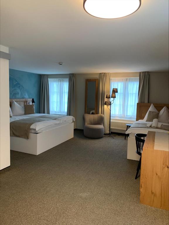 Postel nebo postele na pokoji v ubytování Hotel Engel am Bahnhof