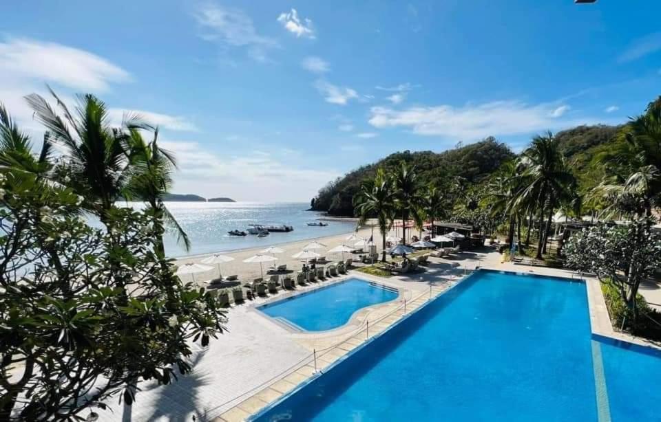 a view of the beach from the resort at Pico De Loro Room Rate in Nasugbu