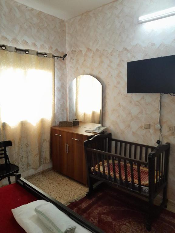 Postel nebo postele na pokoji v ubytování Magtas Hotel