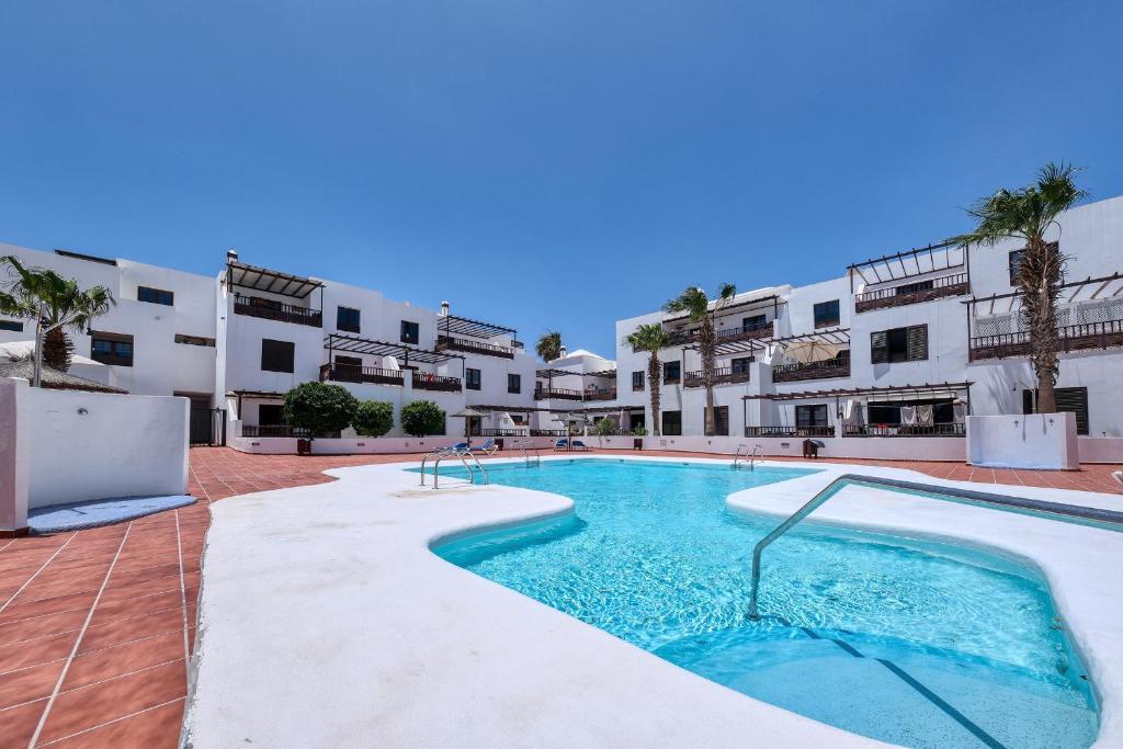 Bazén v ubytování Casa Yare, shared pool, air-con, fast wifi nebo v jeho okolí