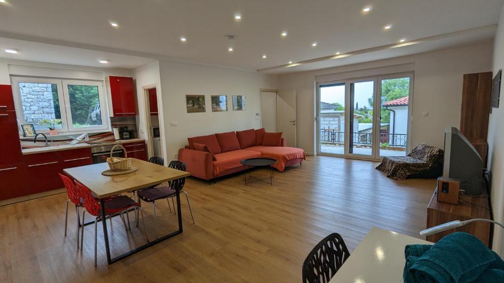 Posezení v ubytování Apartment in an urban villa Kraljevica