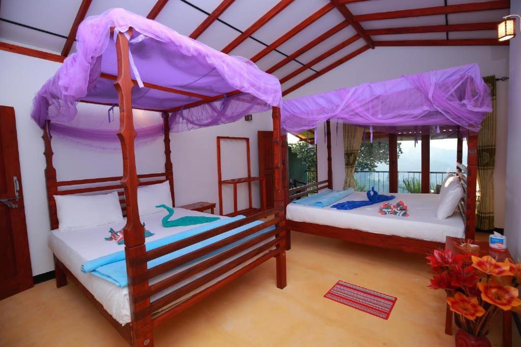 Postel nebo postele na pokoji v ubytování Casa Ninearch Villa