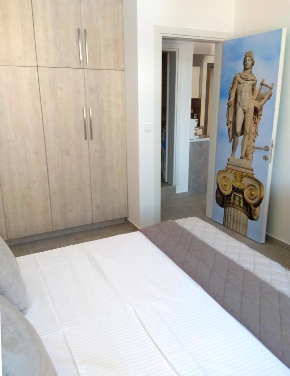 Posteľ alebo postele v izbe v ubytovaní Attalos luxury flat Psyrri square