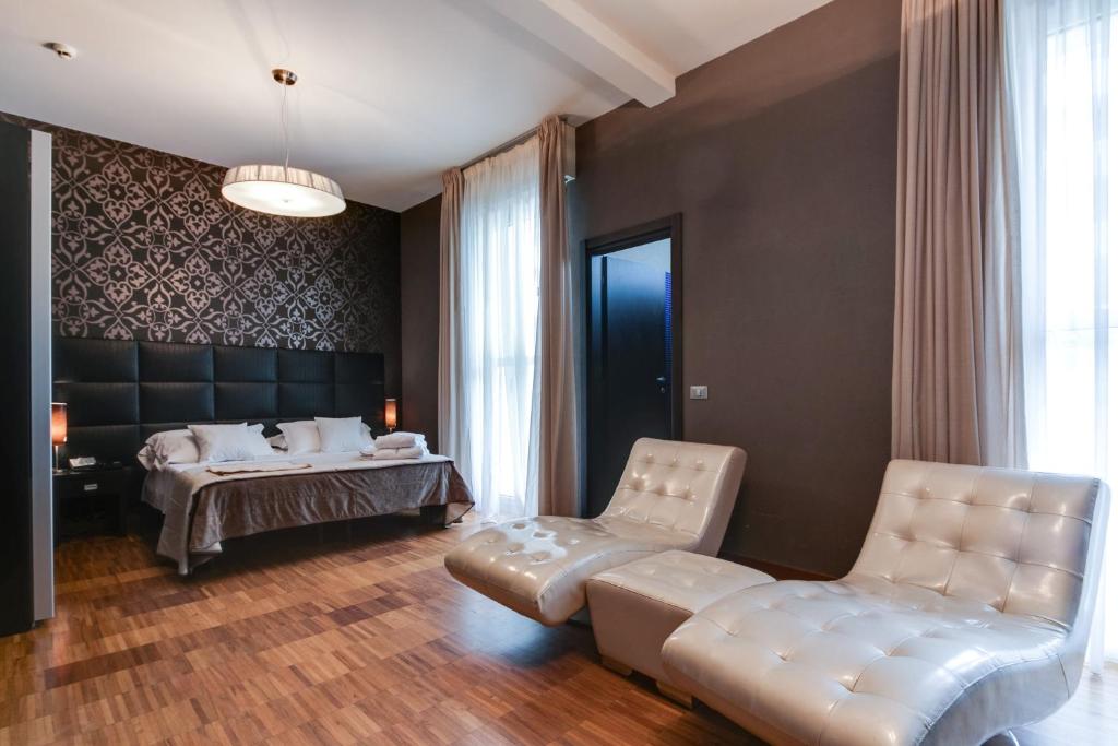 Postel nebo postele na pokoji v ubytování Atmosfere Milano Marittima