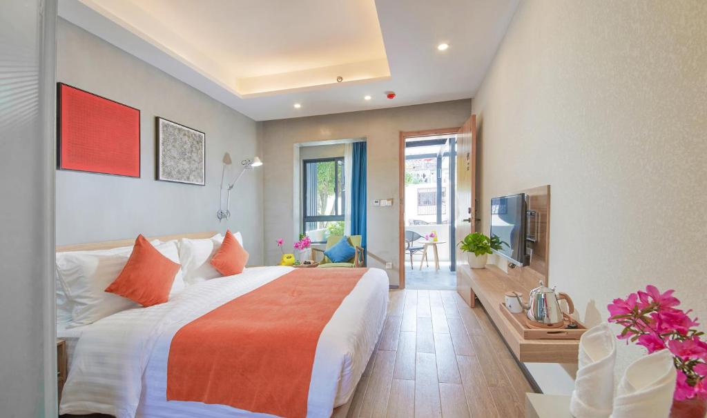 Postel nebo postele na pokoji v ubytování WuZhen Dream Hotel