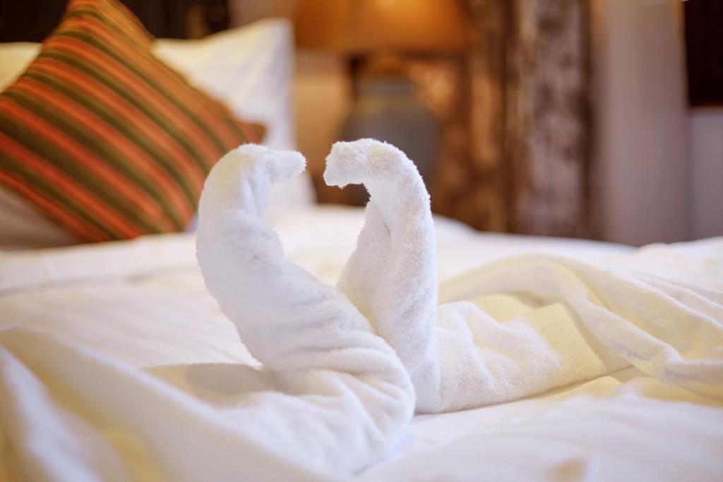 Postel nebo postele na pokoji v ubytování WuZhen Dream Hotel