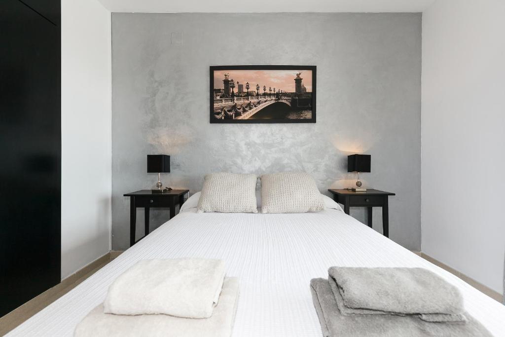 Postel nebo postele na pokoji v ubytování UHC Los Flamencos Family Apartments