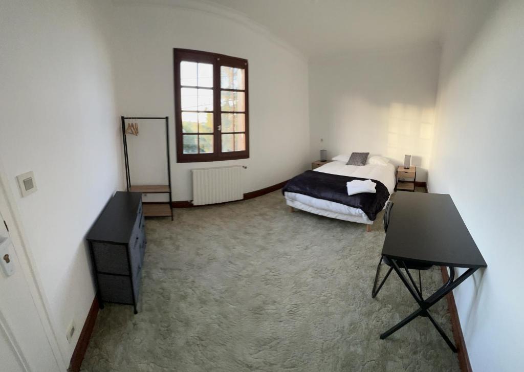 Postel nebo postele na pokoji v ubytování Auberge Mer