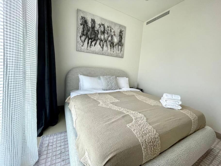 Fotografie z fotogalerie ubytování Dar Vacation - Cozy & Stylish 1BDR Apartment v Dubaji