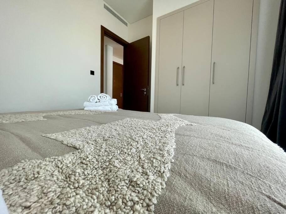 Fotografie z fotogalerie ubytování Dar Vacation - Cozy & Stylish 1BDR Apartment v Dubaji