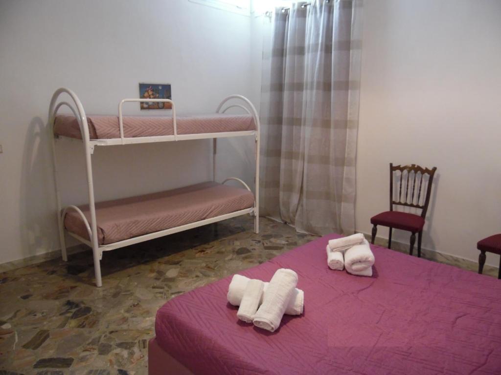 A bed or beds in a room at Casa Aurora