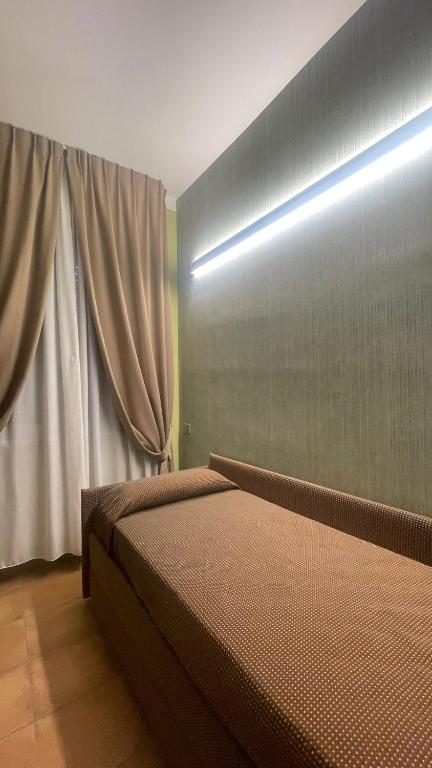 Postel nebo postele na pokoji v ubytování Hotel San Marco
