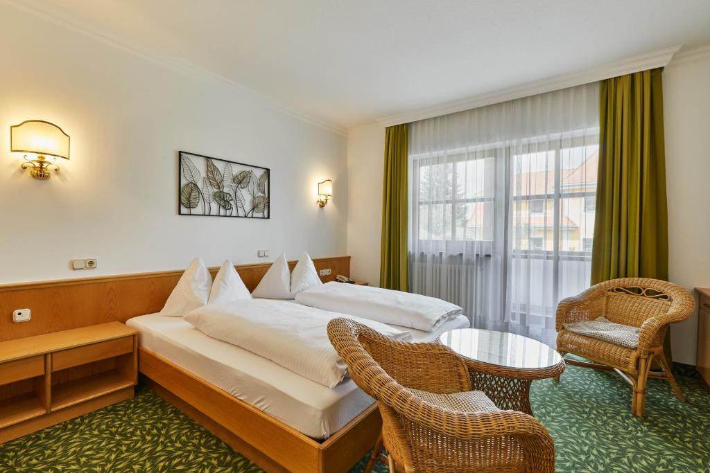 Postel nebo postele na pokoji v ubytování Hotel Lindenhof