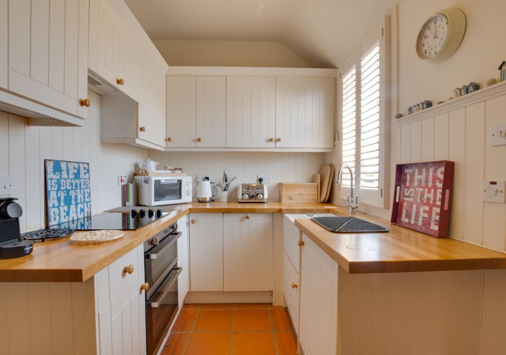 Kuchyň nebo kuchyňský kout v ubytování No 4 Armstrong Cottage Isobel