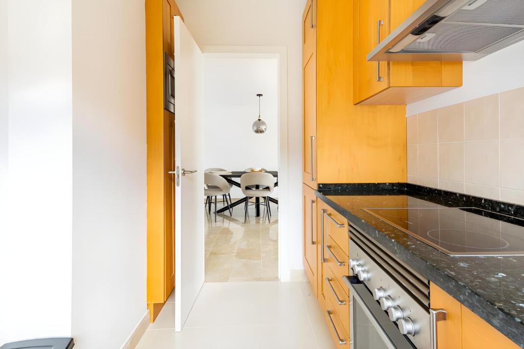 A kitchen or kitchenette at Luxury & Sunny Apartment with Breathtaking View in Marbella East